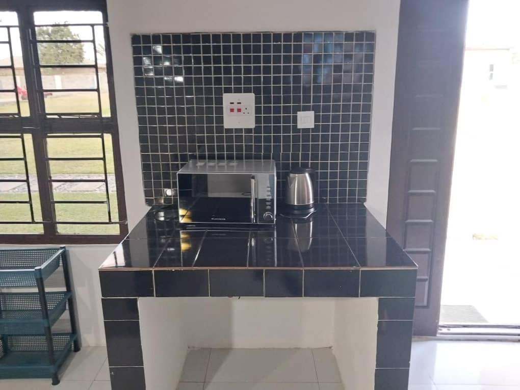 צ'ינגולה Emmrose Apartments מראה חיצוני תמונה