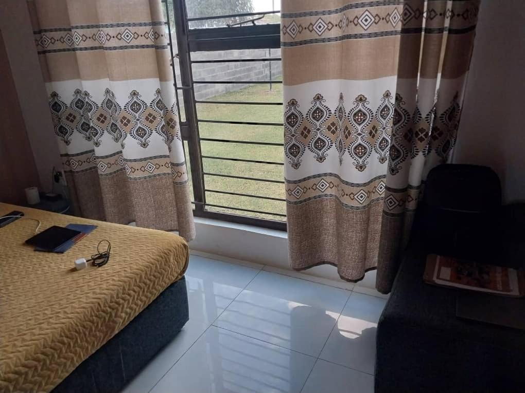 צ'ינגולה Emmrose Apartments מראה חיצוני תמונה